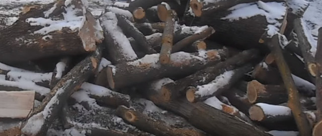 Отопление теплицы дровами